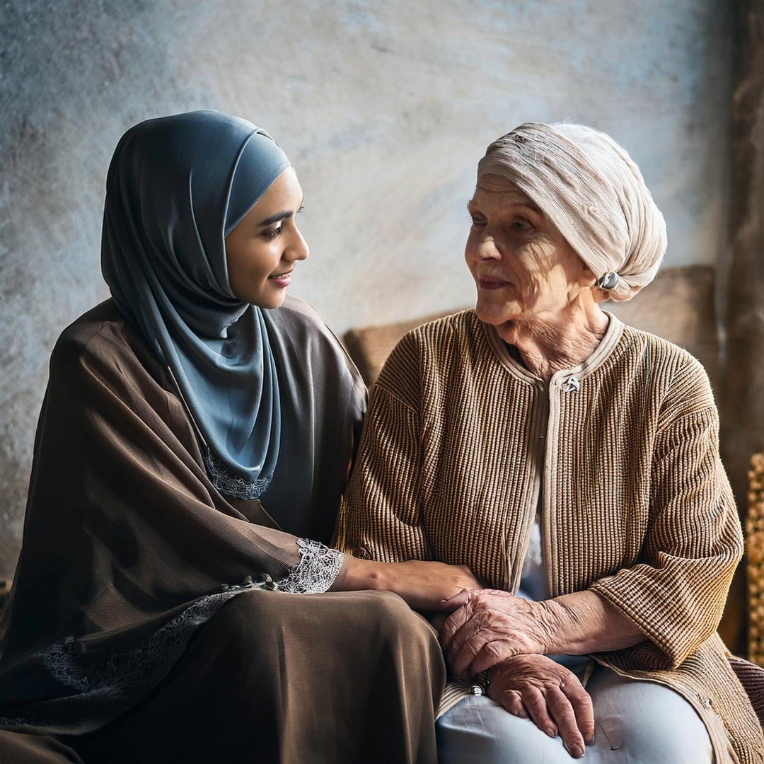 a young woman siting beside an old woman